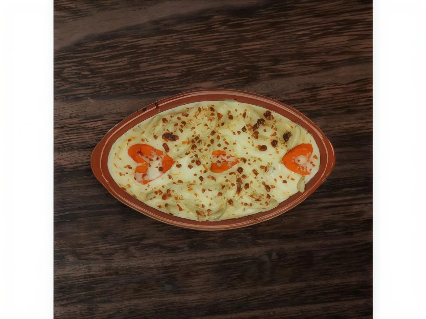 طاجن مكرونة بالجمبري كريمة