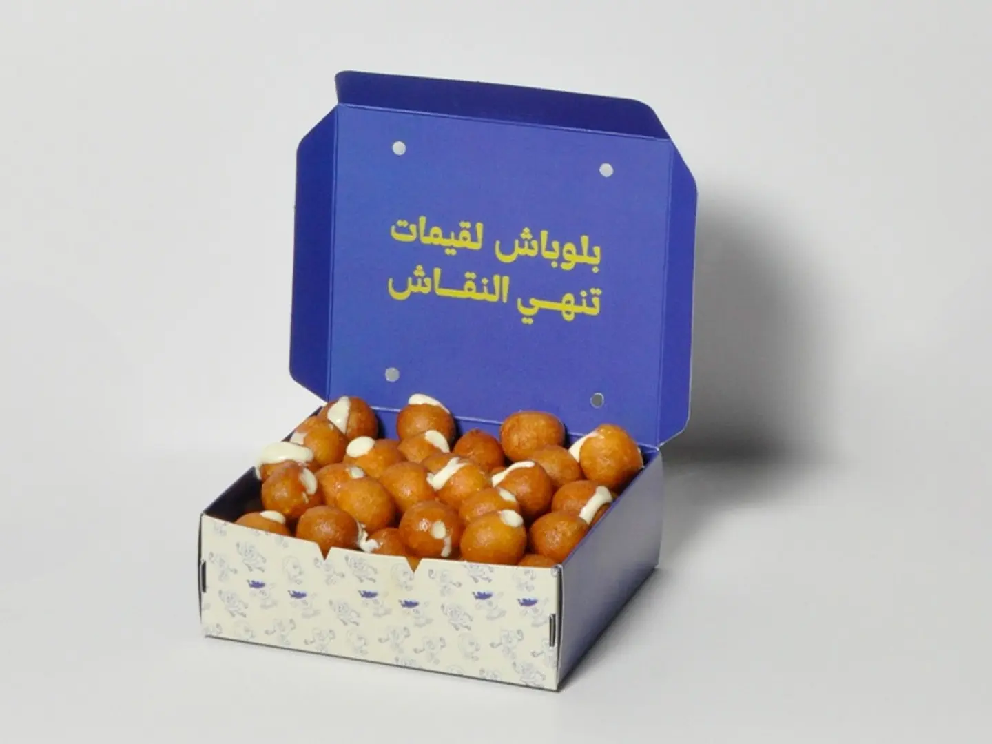 Luqaimat With Syrup Stuffed With Cheese
