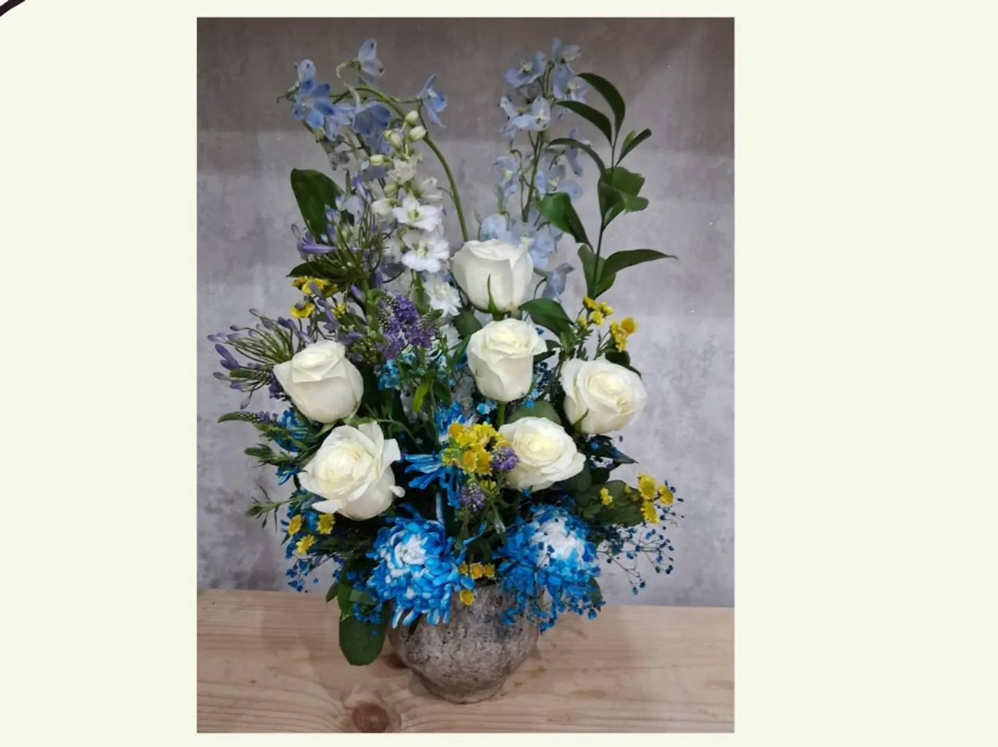 Blue Stone Vase White Roses And Green Leaves