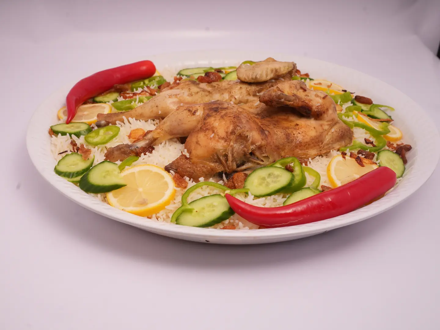 نصف دجاج حنيذ مع الرز