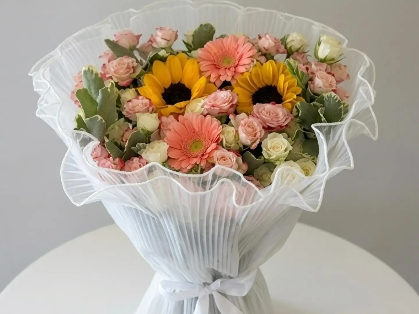 A Luxurious Gift Bouquet Of Natural Roses In Elegant Packaging