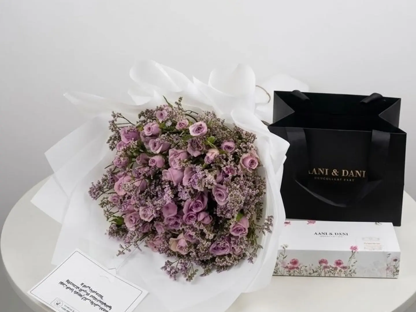 Chocolate Aani & Dani With An Elegant Bouquet