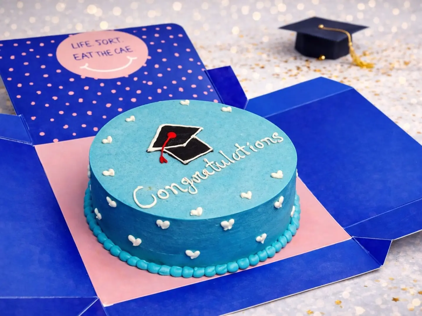 كيك التخرج ازرق