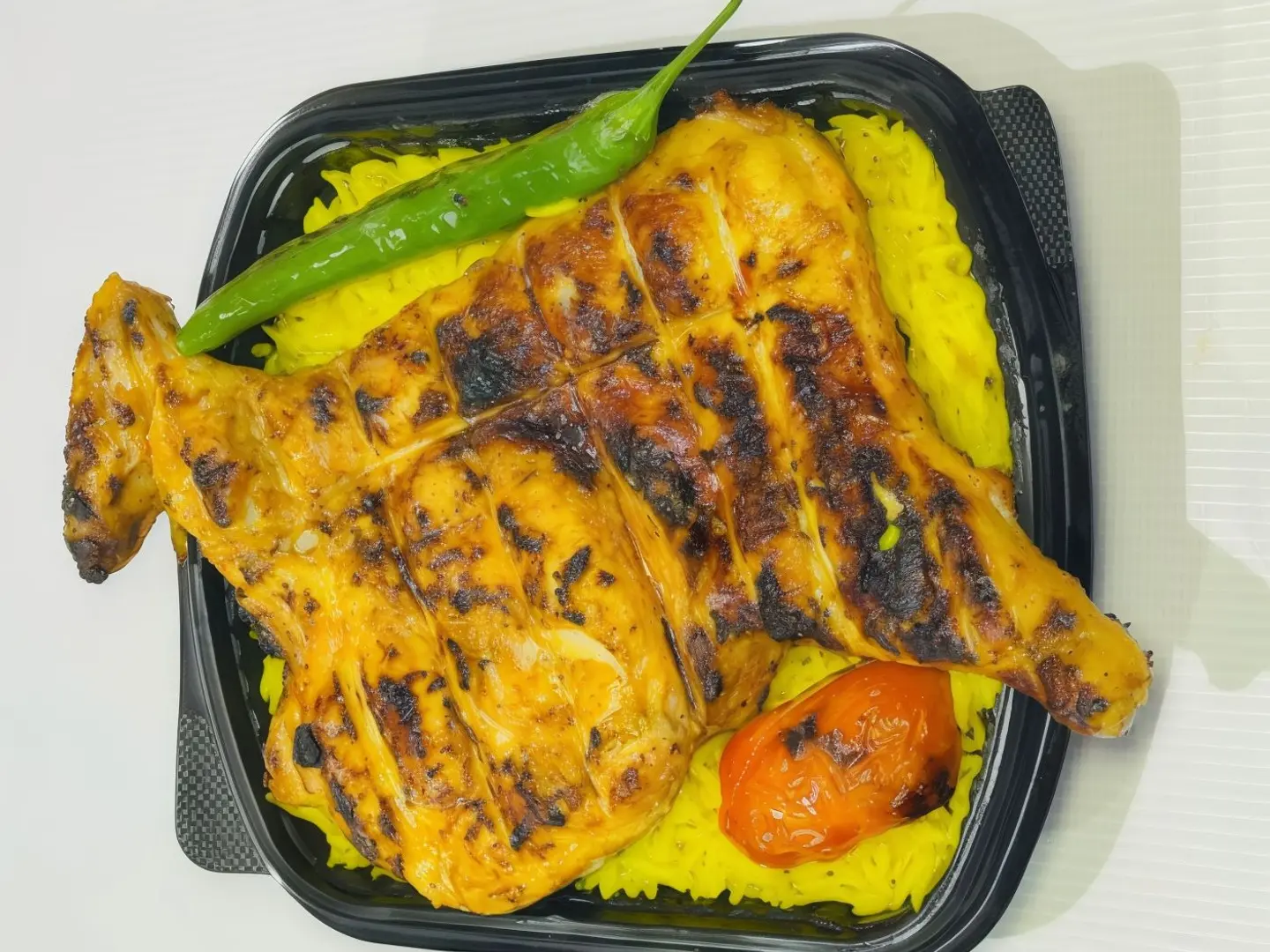 وجبة نصف دجاج علي الفحم