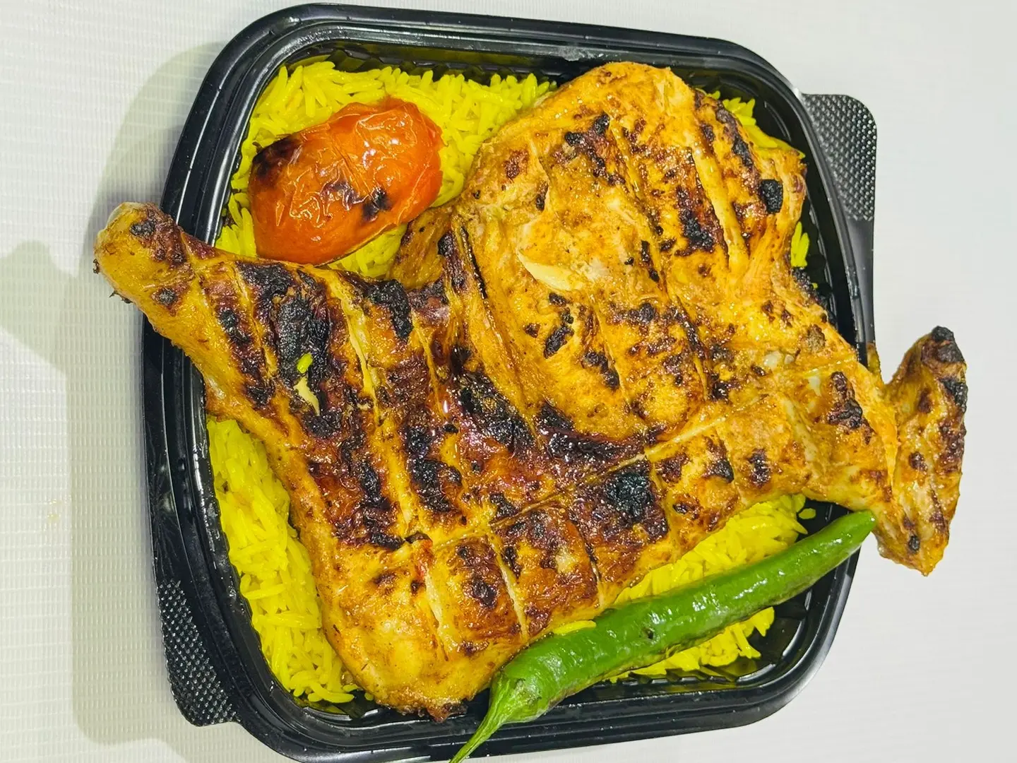 نصف دجاج مشوي علي الفحم