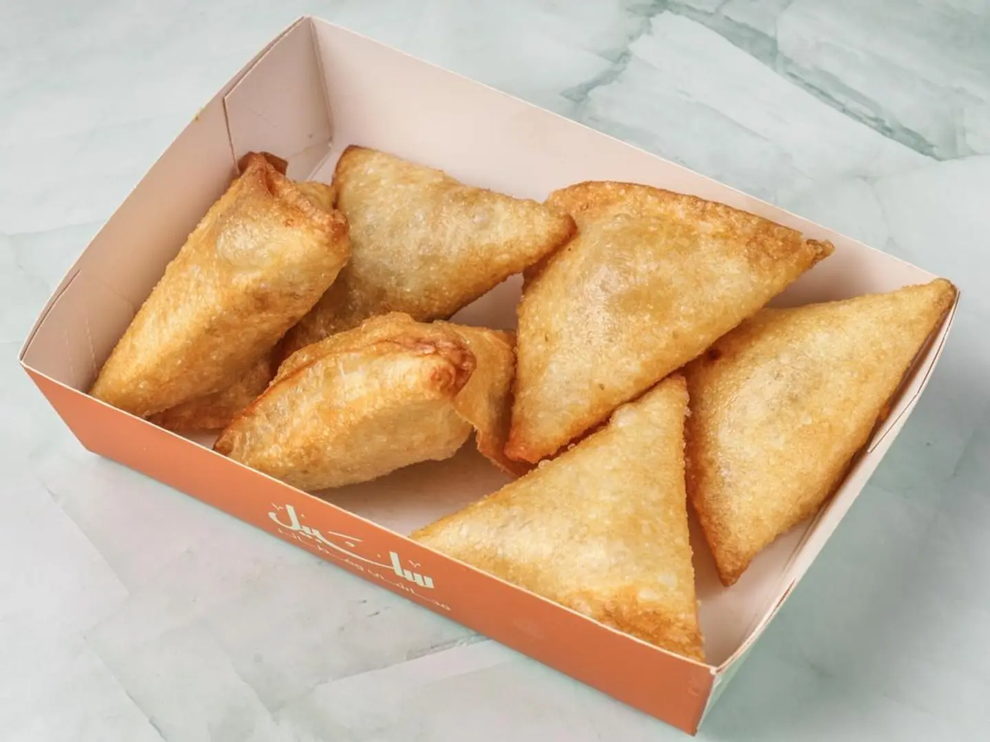 Small Plate Of Chicken Samosas