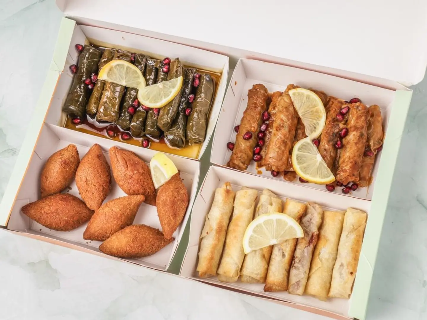 A Four Dish Stuffed Vegetable Box Consisting Of The Customer's Choice