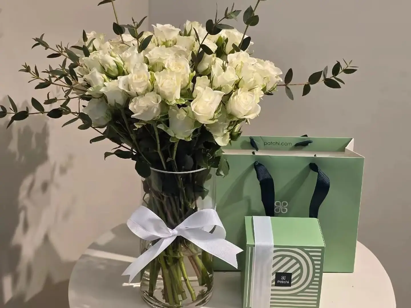 Pachyderm Vase With White Roses