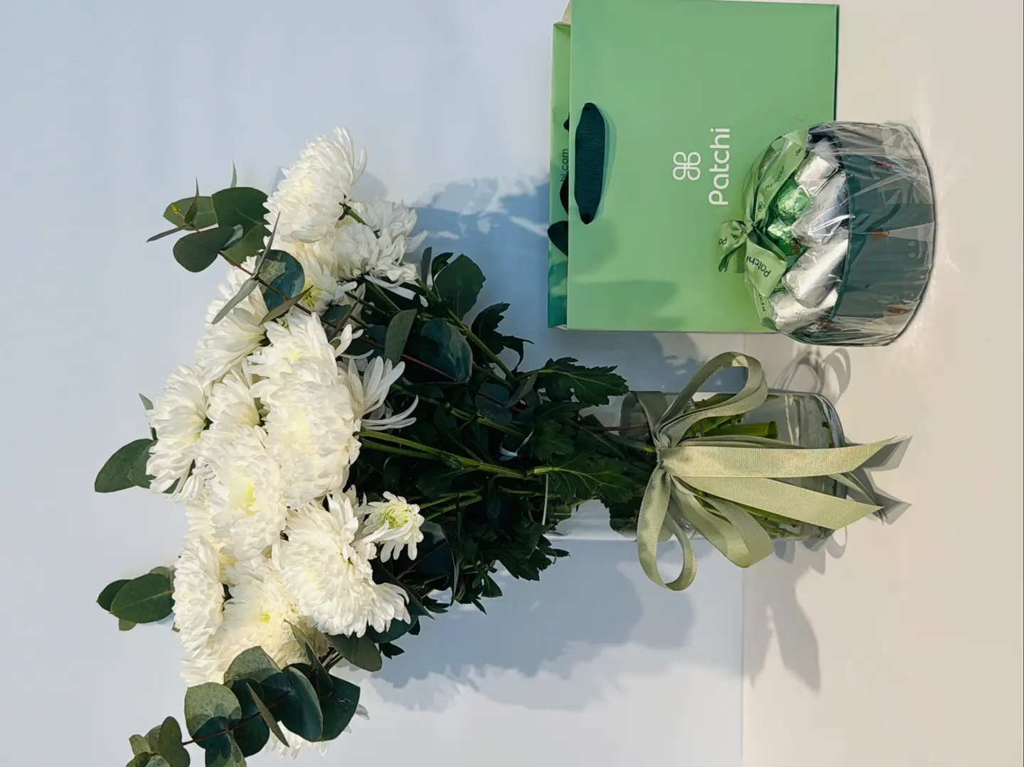 Baci Chocolate With A Vase Of Natural Flowers