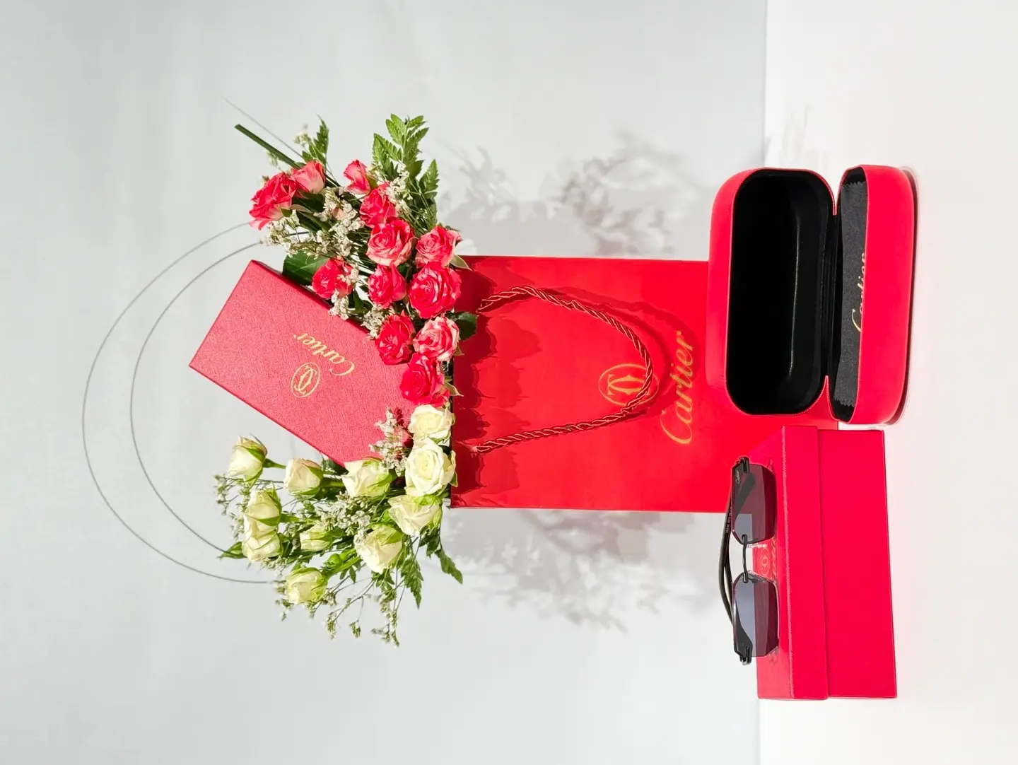 Cartier Glasses With Fresh Flowers And A Complimentary Card.