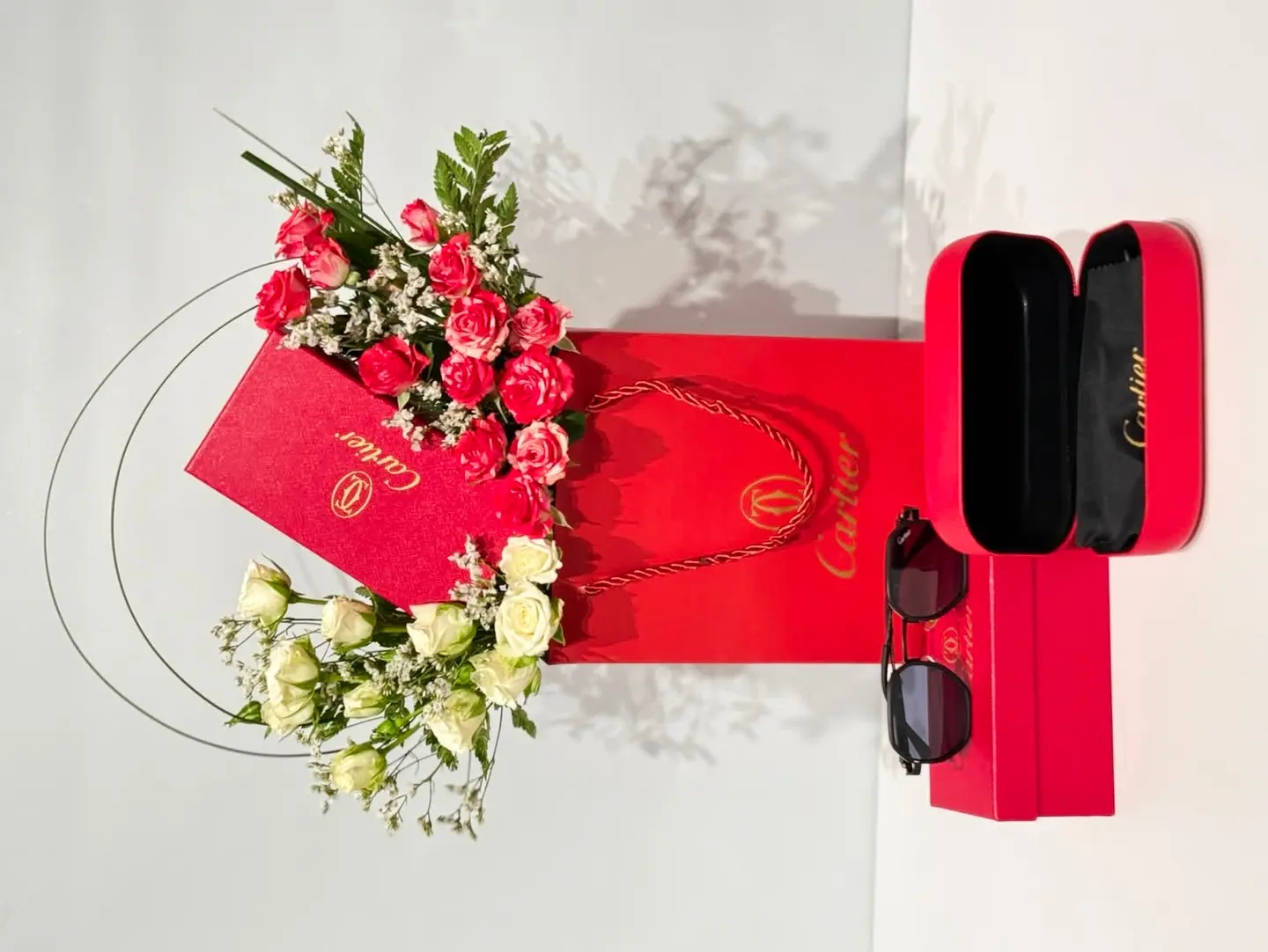 Cartier Glasses With Fresh Flowers And A Complimentary Card.