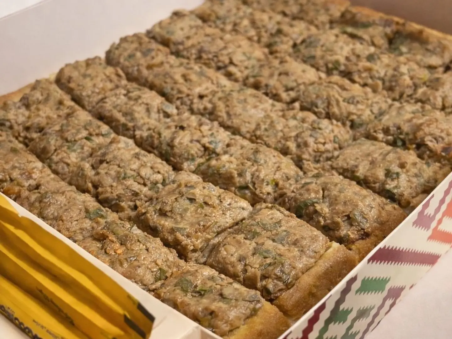 صينية عيش باللحم