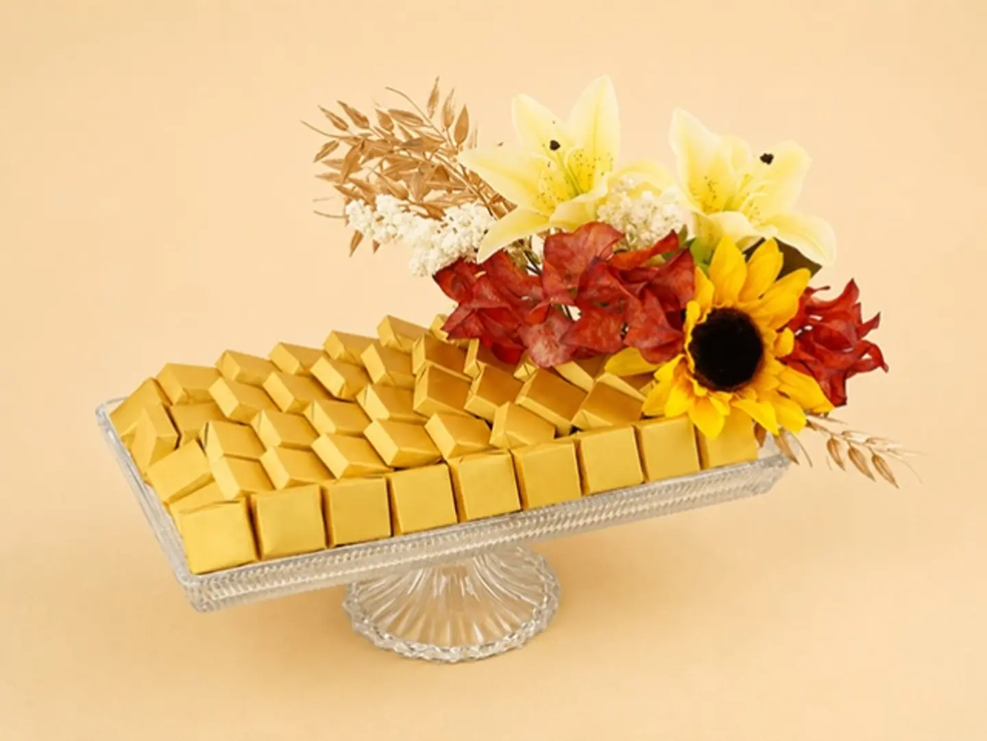 A Tray Of Roses And Golden Chocolates