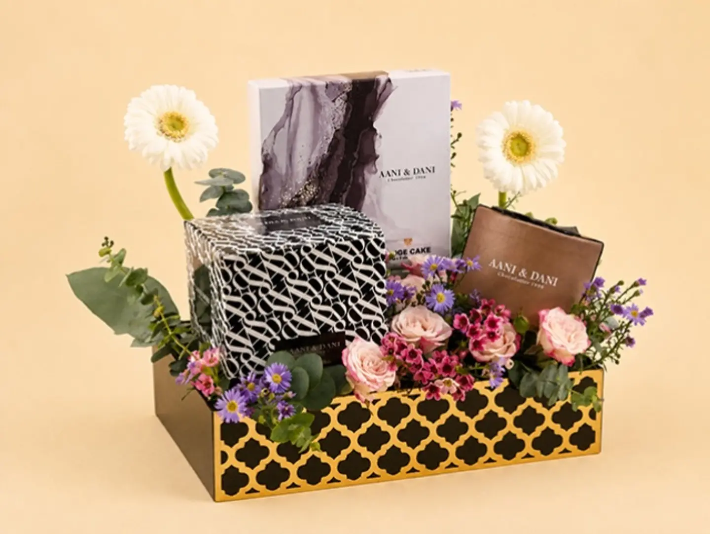 Chocolate Gifts For Annie And Danny, And A Flower Arrangement.
