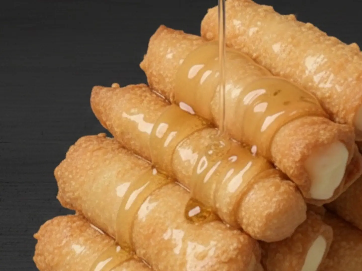 Cheese Fingers With Saffron Syrup