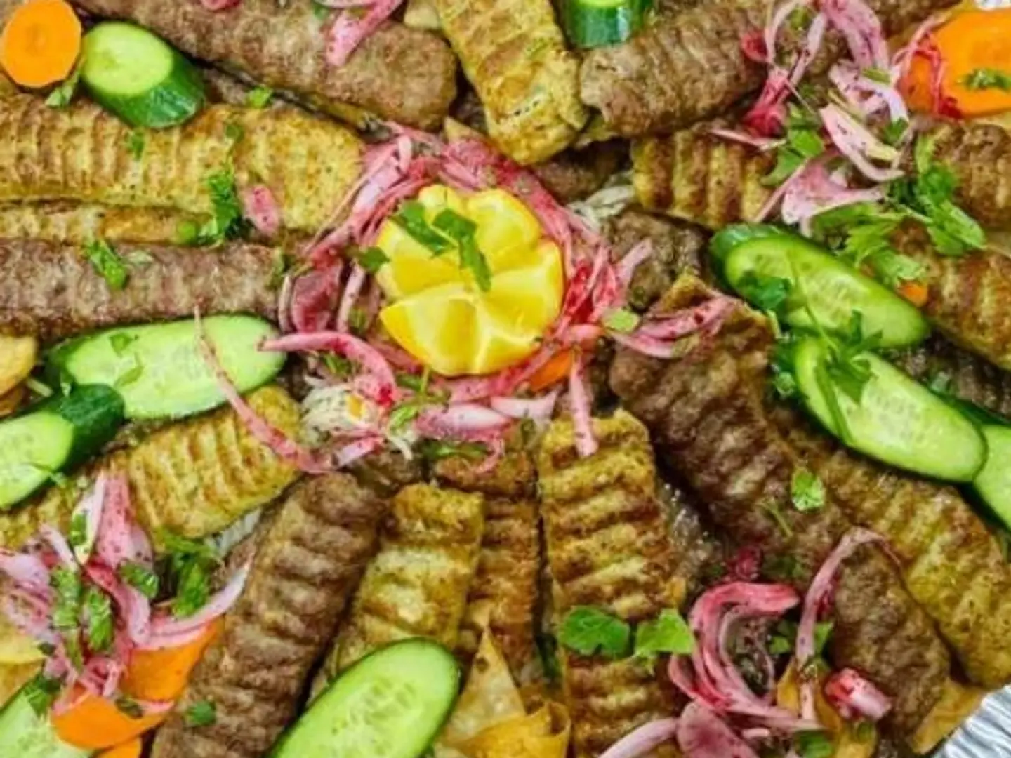 Small Plate Of 3 Skewers Of Grilled Lamb Kebab