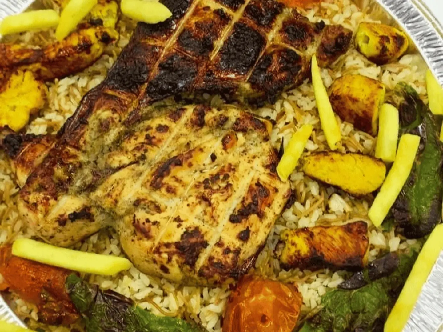 A Small Tray Of Half A Chicken With Rice, 1 Skewer, 1 Shish Tawook, 1 Stew, And 1 Soft Drink.