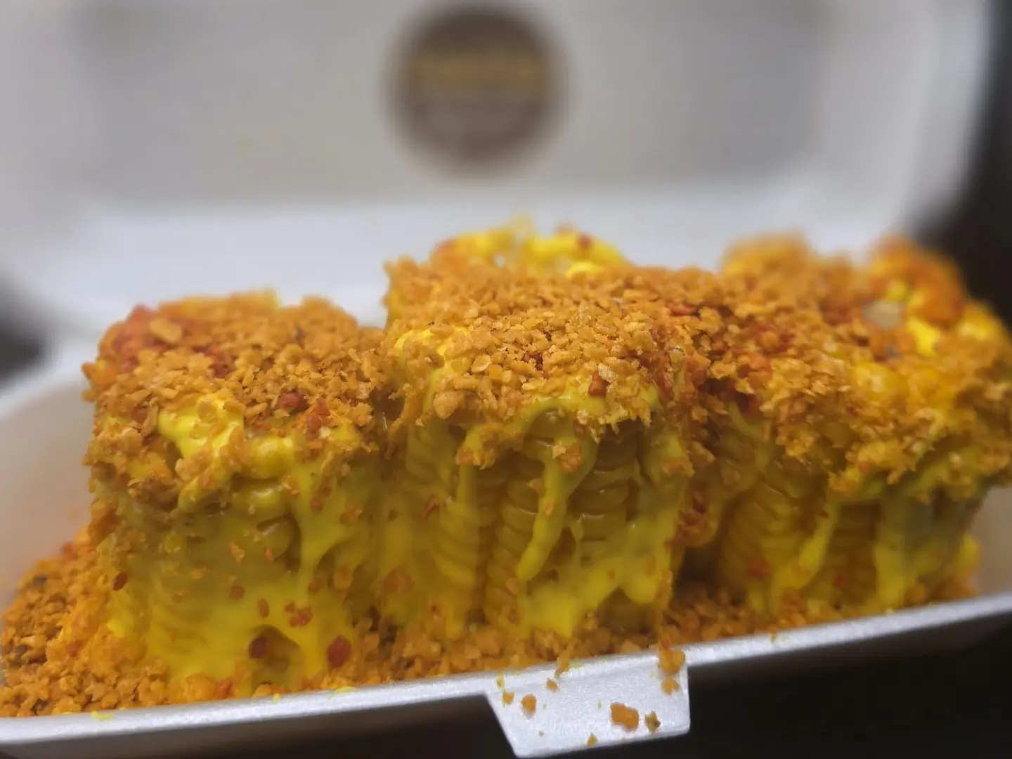 Corn On The Cob Cut With Cheese And Doritos