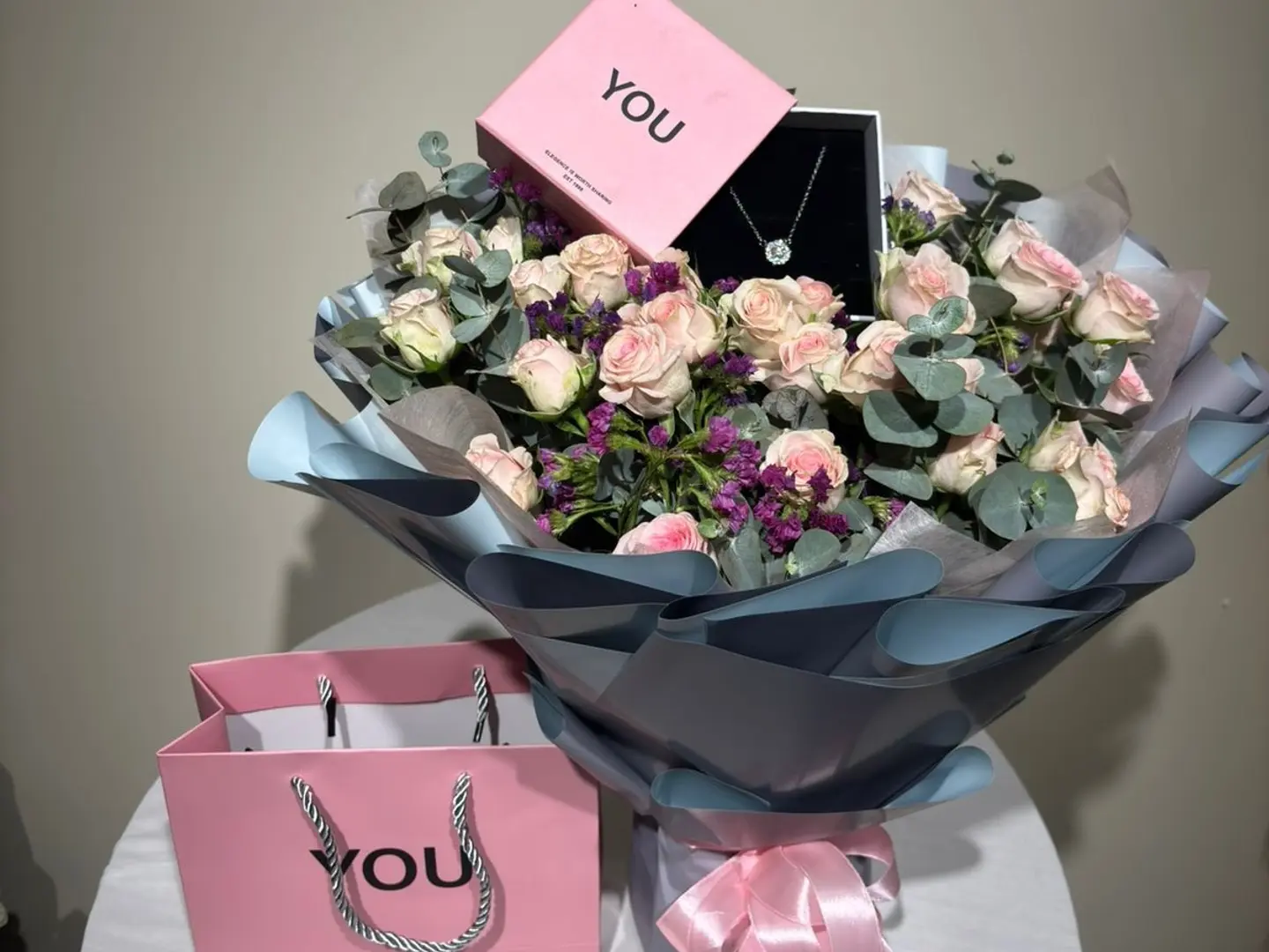 Elegant Touch Flower Arrangement With Brand You Necklace