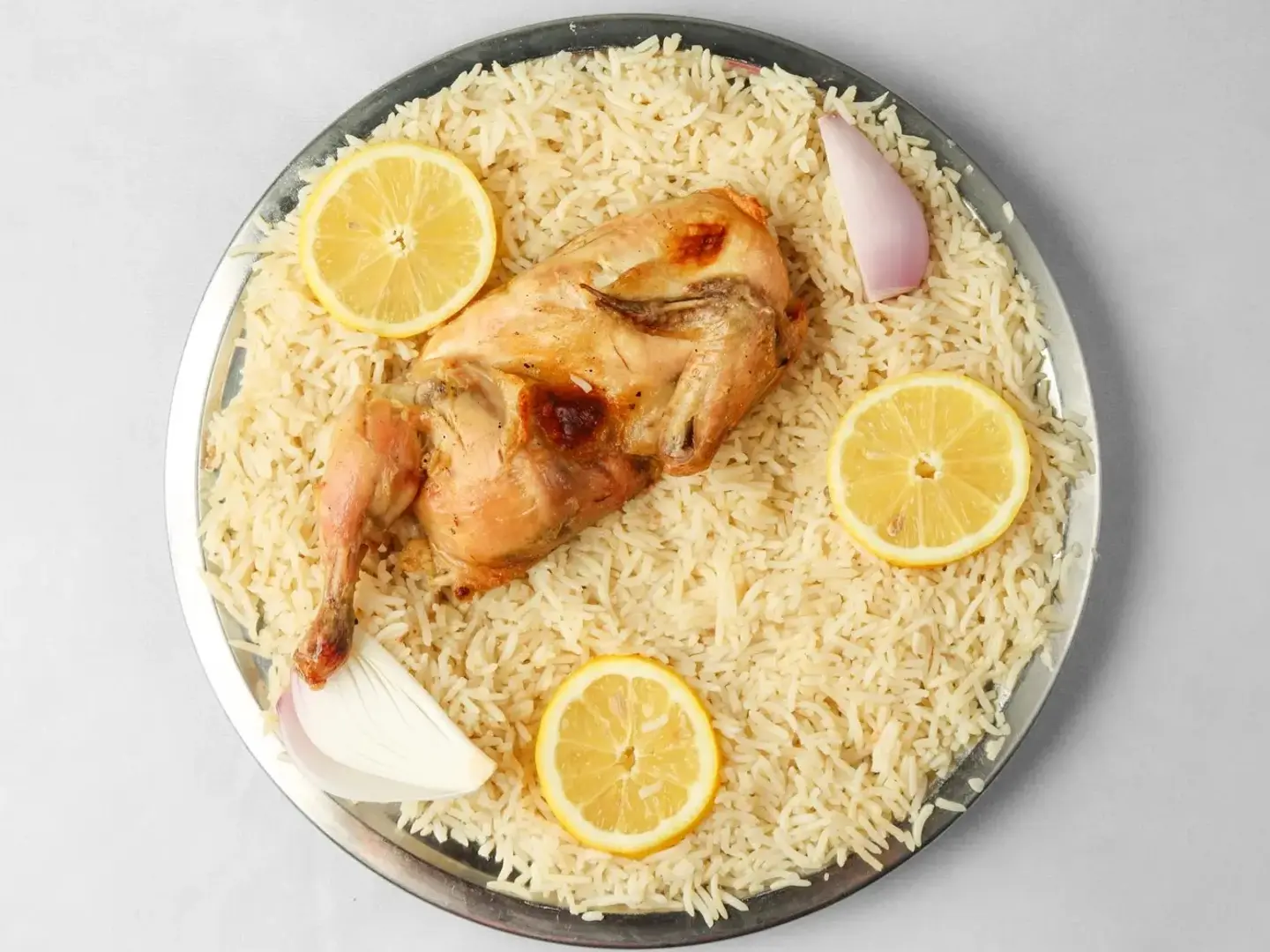 نصف دجاج حنيذ