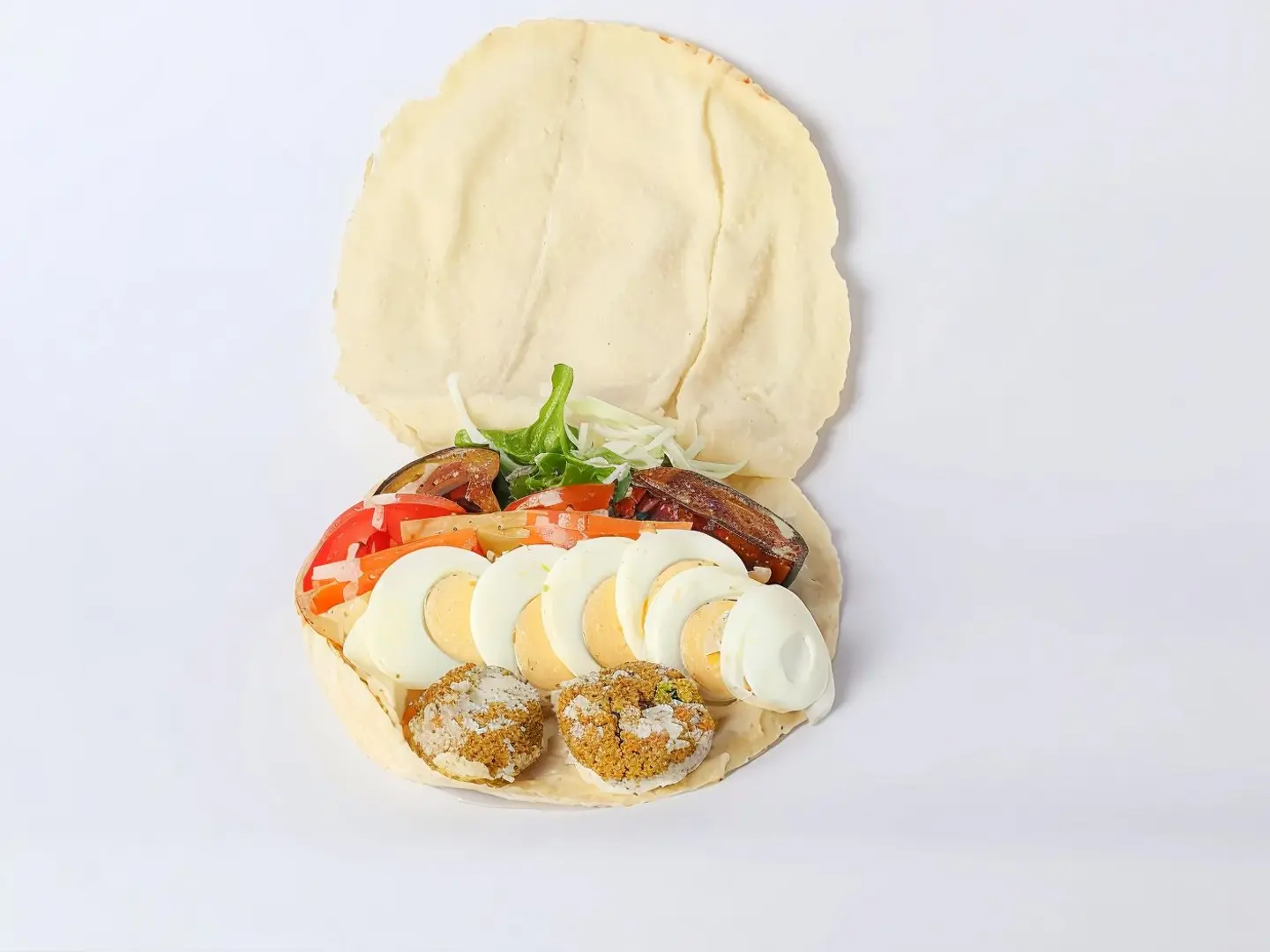 Falafel Sandwich With Hummus And Eggs