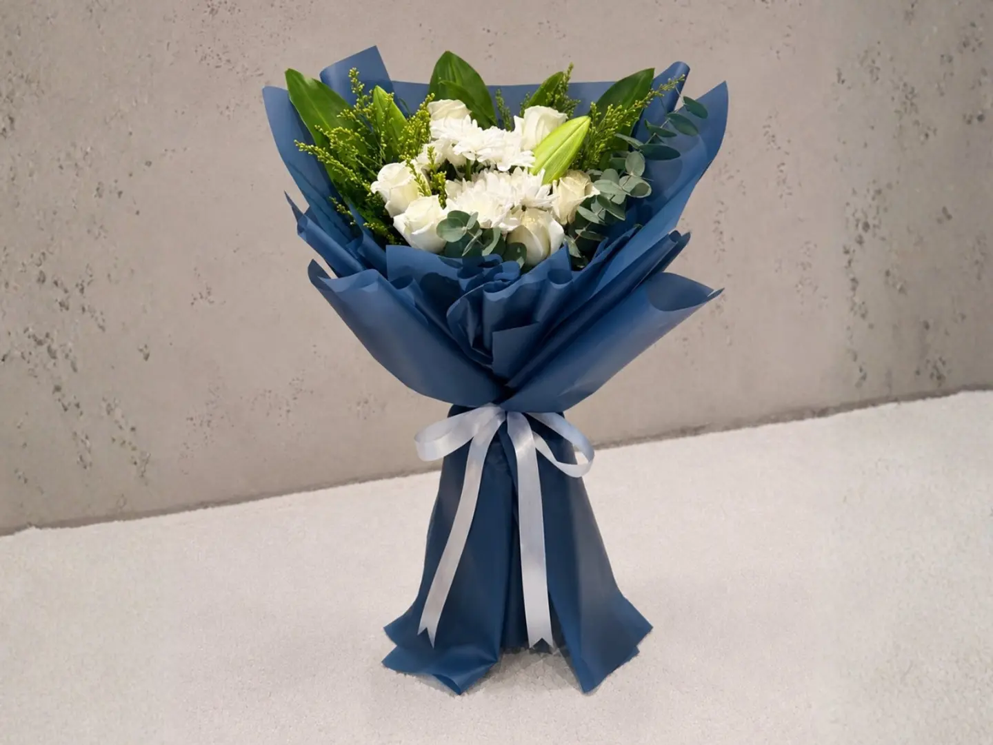 White Flower Bouquet With Blue Wrapping