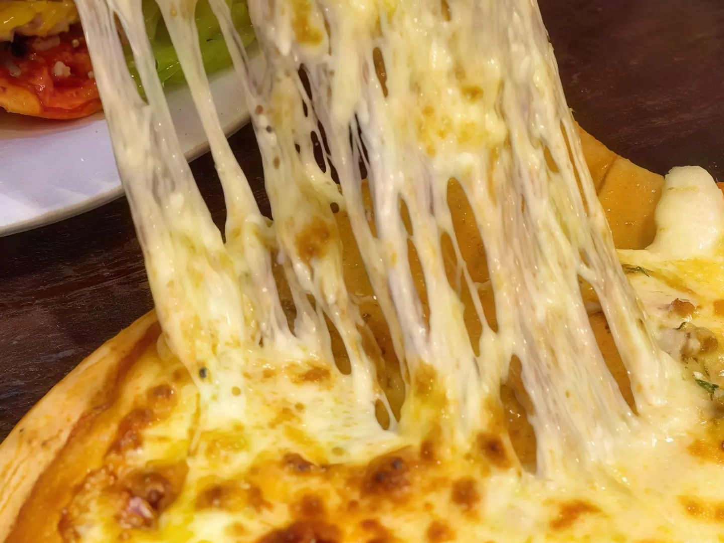 بيتزا الذواق