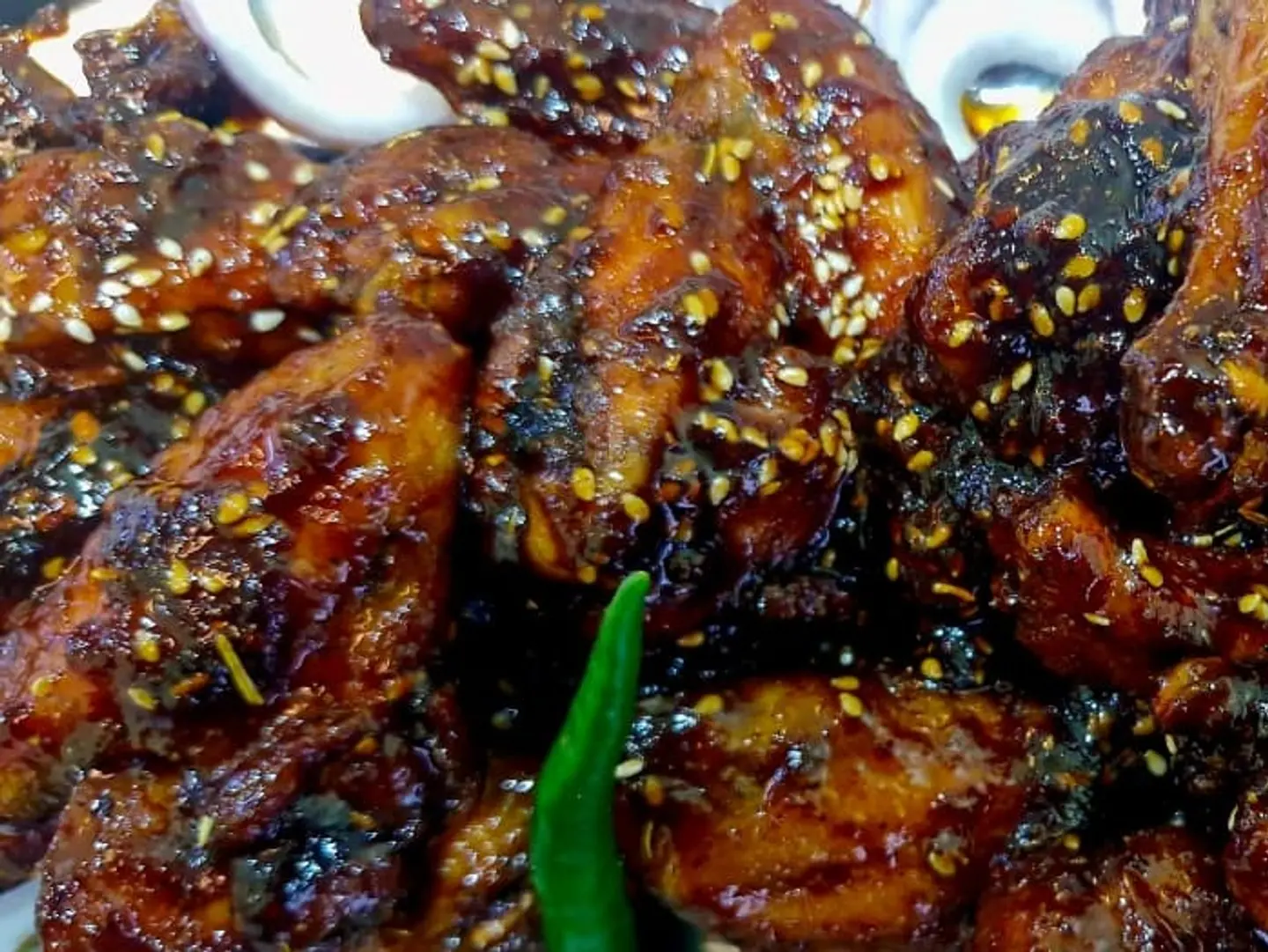 Six Chicken Wings Bbq Honey Sesame Coated With Fries Bun Or Kubuz