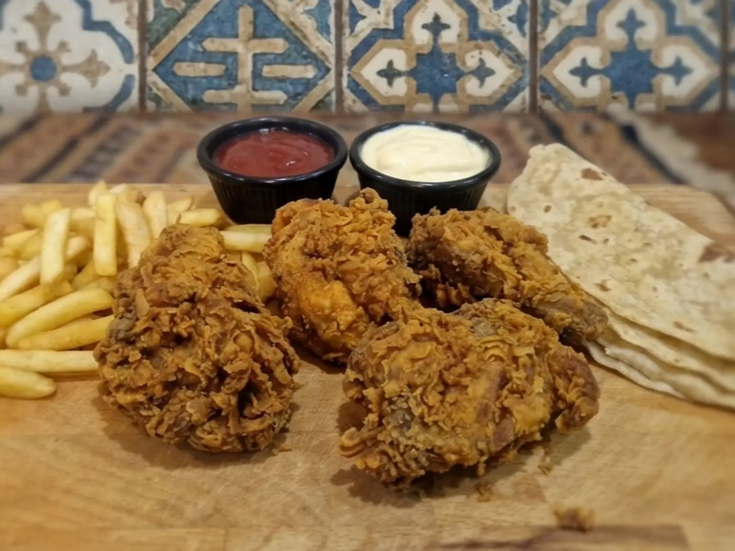 Four Pieces Of Broasted Chicken With Fries Ketchup Spicy Garlic Sauce
