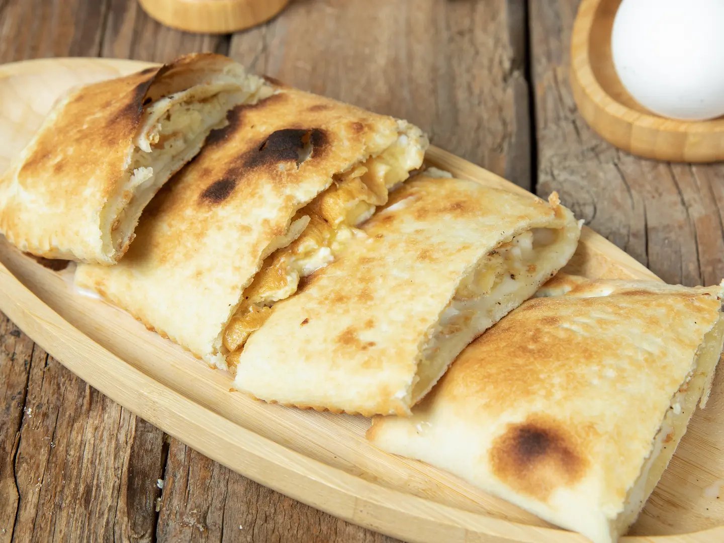 Fried Eggs With Melted Cheese