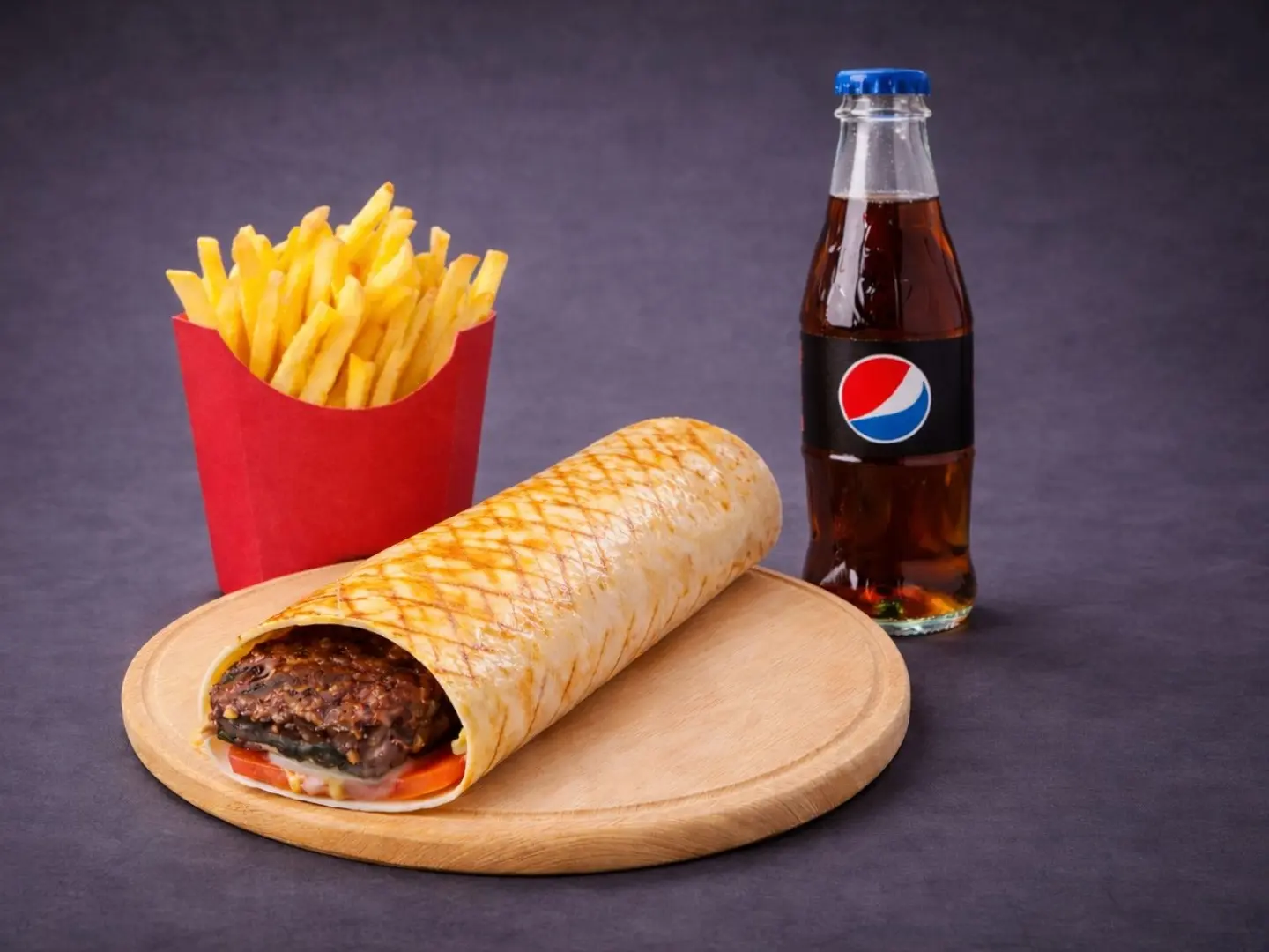 Meat Kebab Sandwich With Potatoes And A Soft Drink