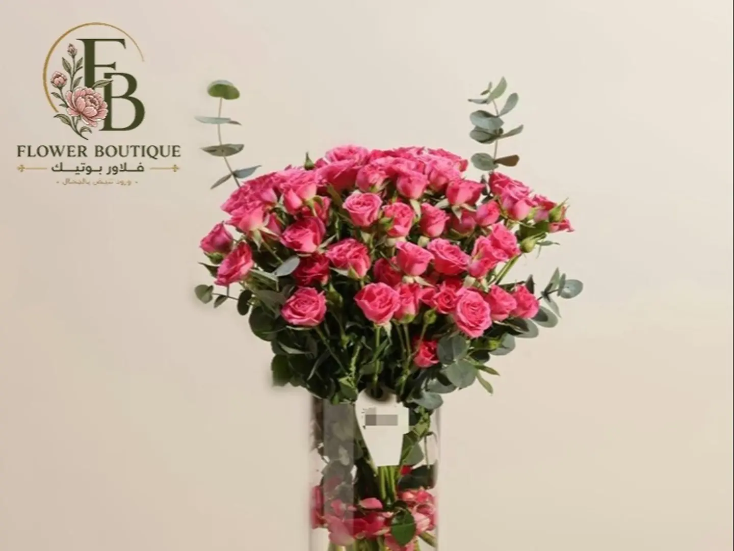 15 Fuchsia Baby Roses In A Clear Vase