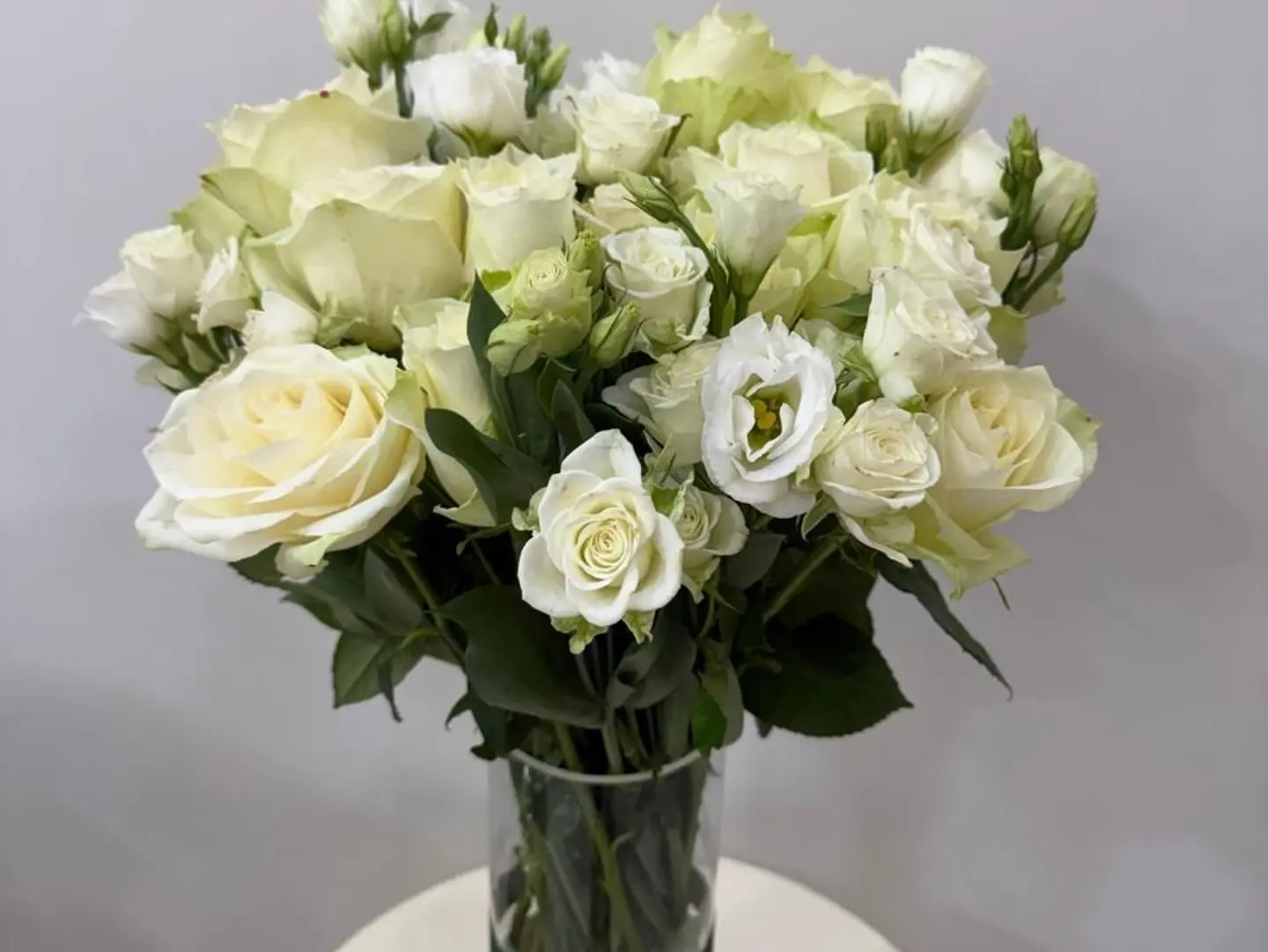 A Beautiful Vase With White Flowers