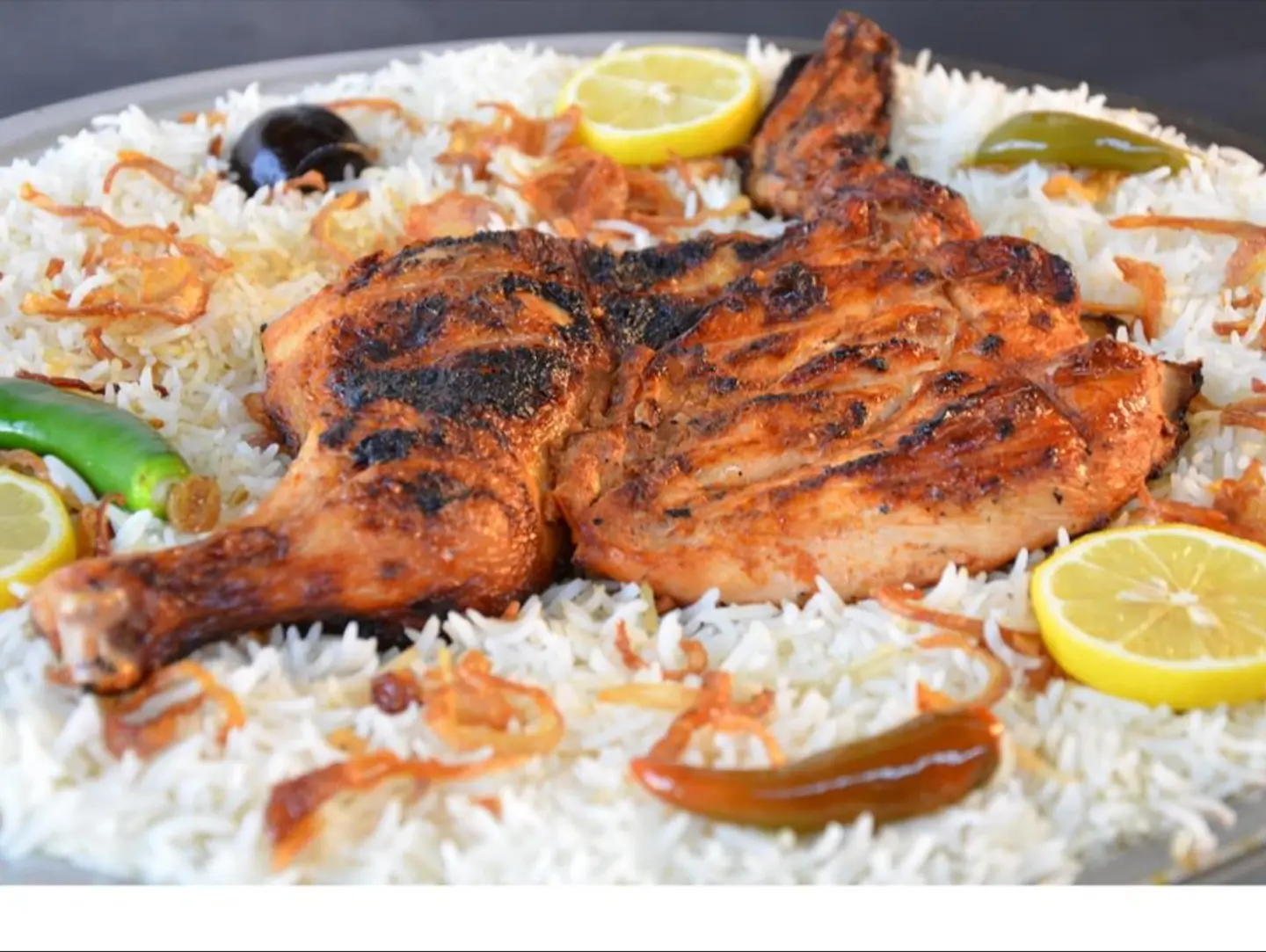 Half A Grilled Chicken With Rice