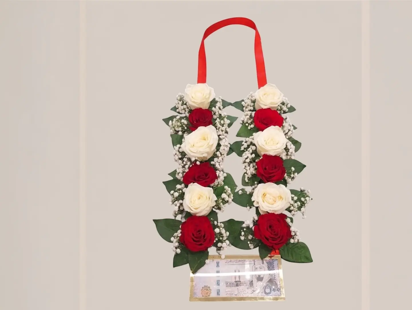 Floral Arrangement For Special Occasions With A Money Envelope