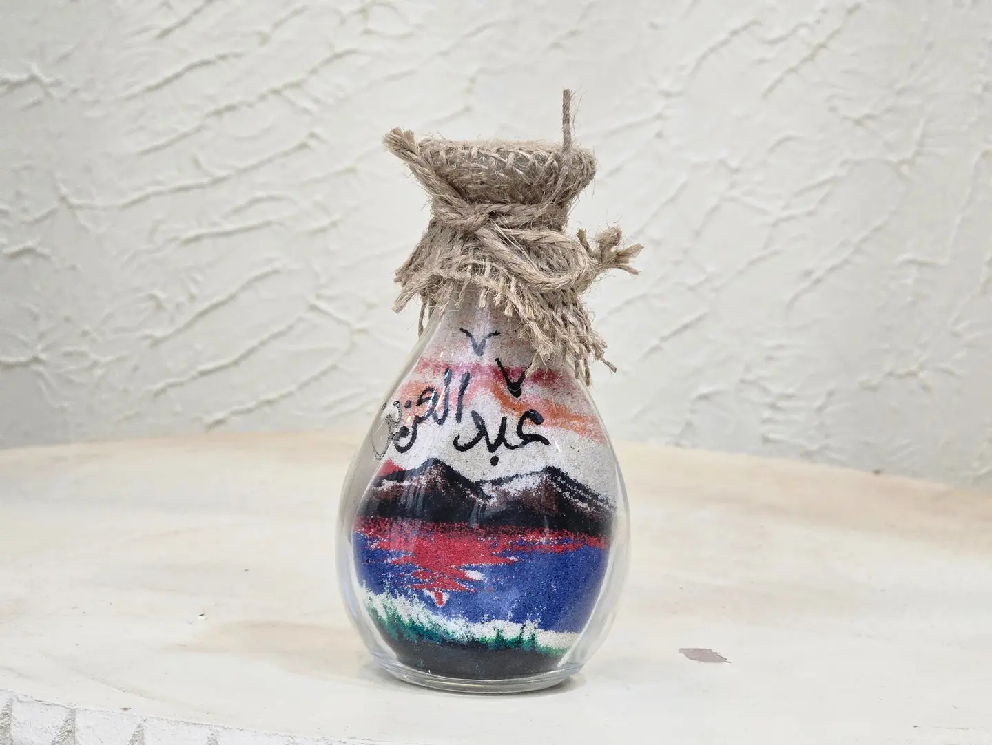 A Bottle Of Sand With Abdulaziz's Name On It