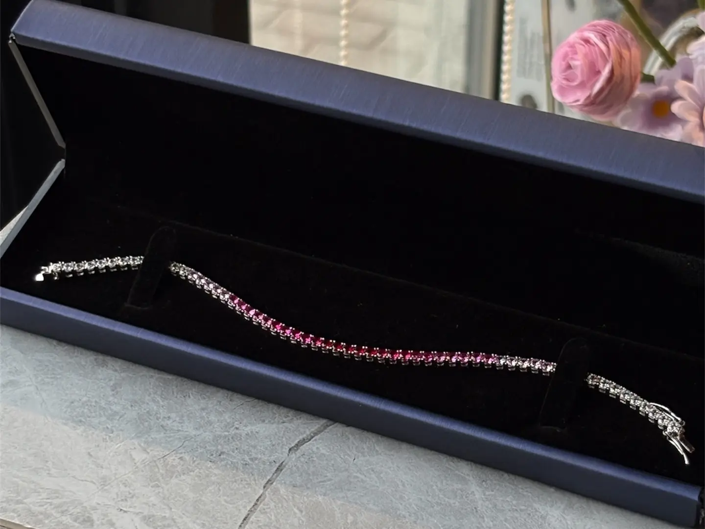 سوارة تنس الوردية