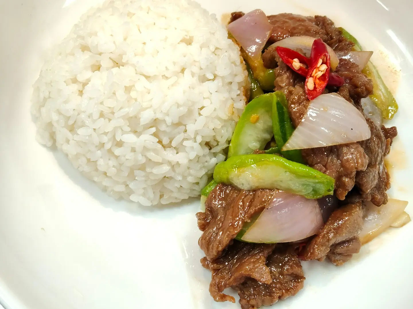 Stir Fried Loofah With Camel Meat Over Rice