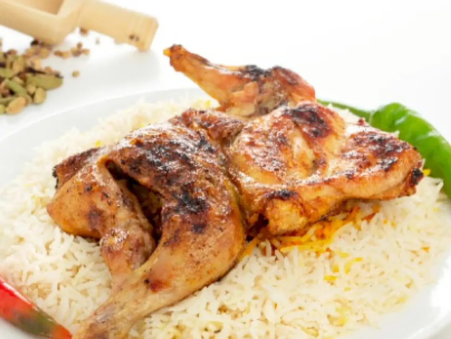 نصف دجاجة مظبي خاص مع رز البشاور.