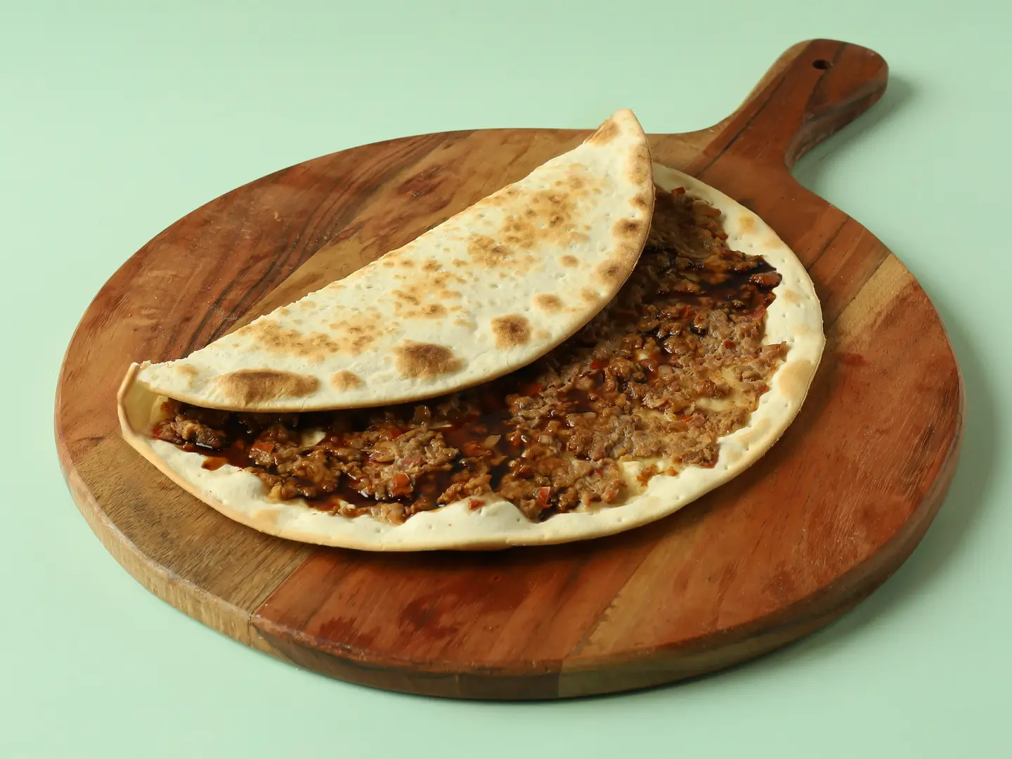 منقوشة لحم مع دبس رمان