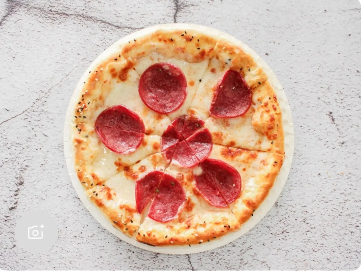 بيتزا ببروني وسط