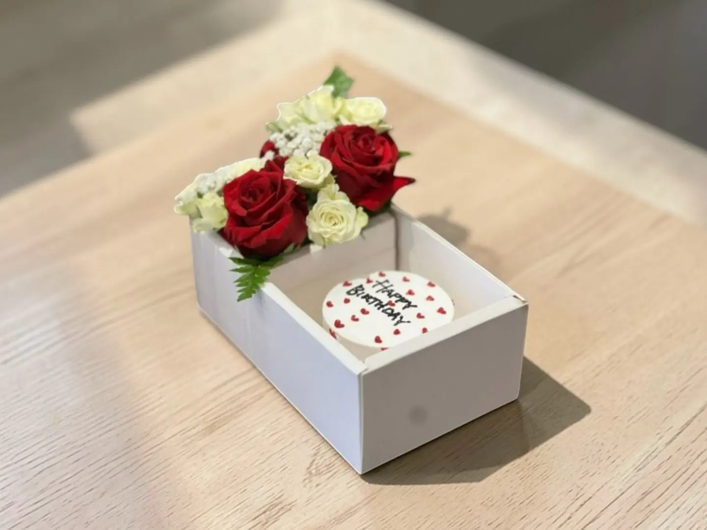 Flowers And Cake Arranged In A Box - The Rose Is Red