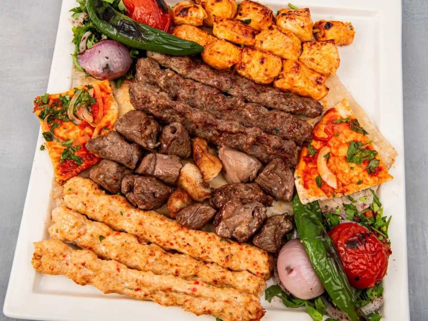 Savings Platter: Half Chicken With Beef Kofta, Shish Tawook, Hawawshi, Rice, And Salads