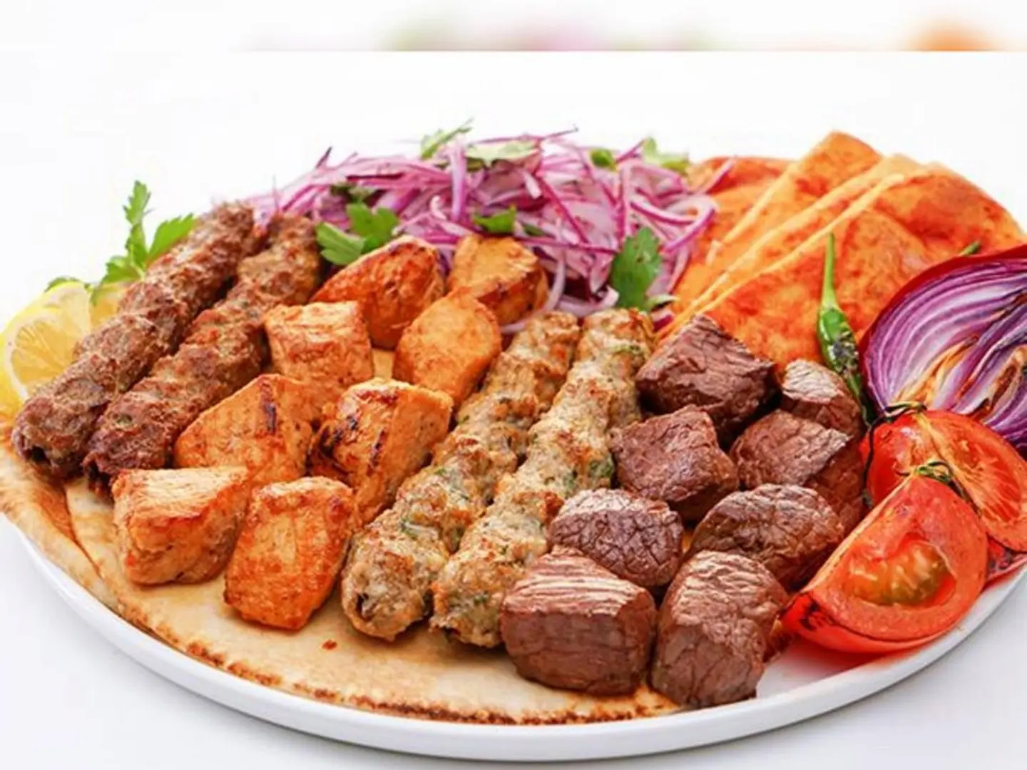 Half A Kilo Of Mixed Grill Kebab, Kofta, Shish, And Ribs With Rice And Salad