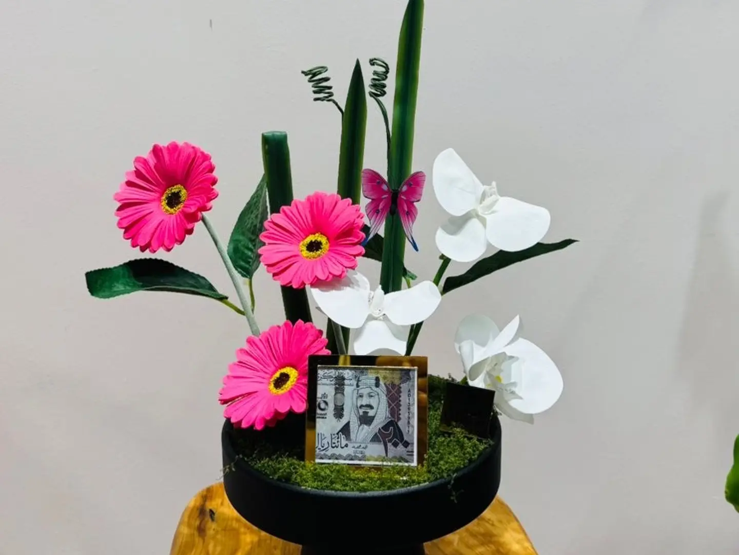 Artificial Pink And White Floral Arrangement With A Black Base