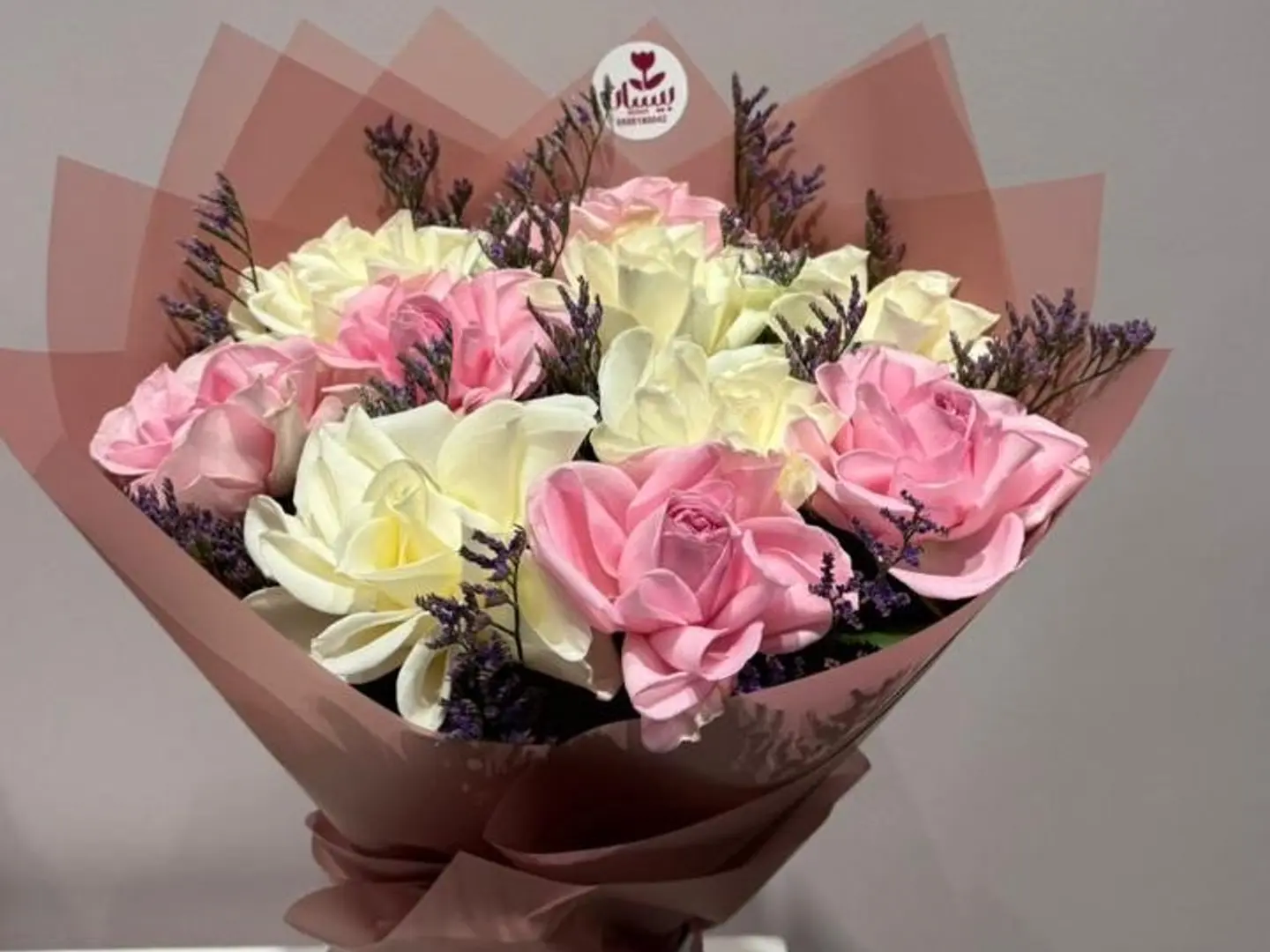 Pink And White Flower Bouquet With Wonderful Packaging