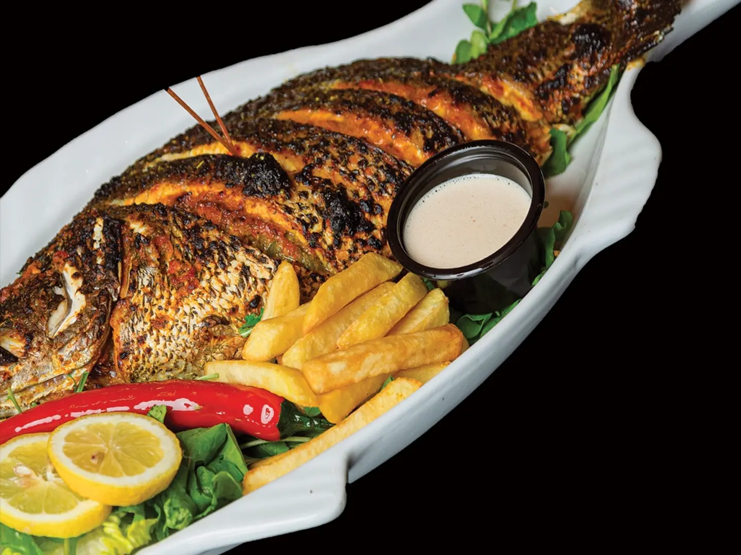 سمك زيت وليمون