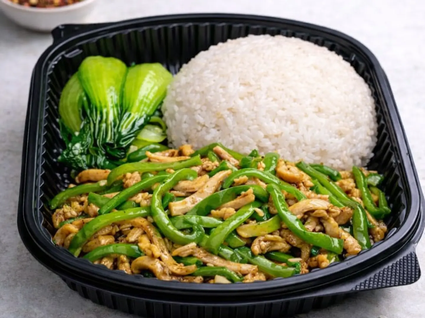 Rice Meal With Sliced Chicken And Green Pepper