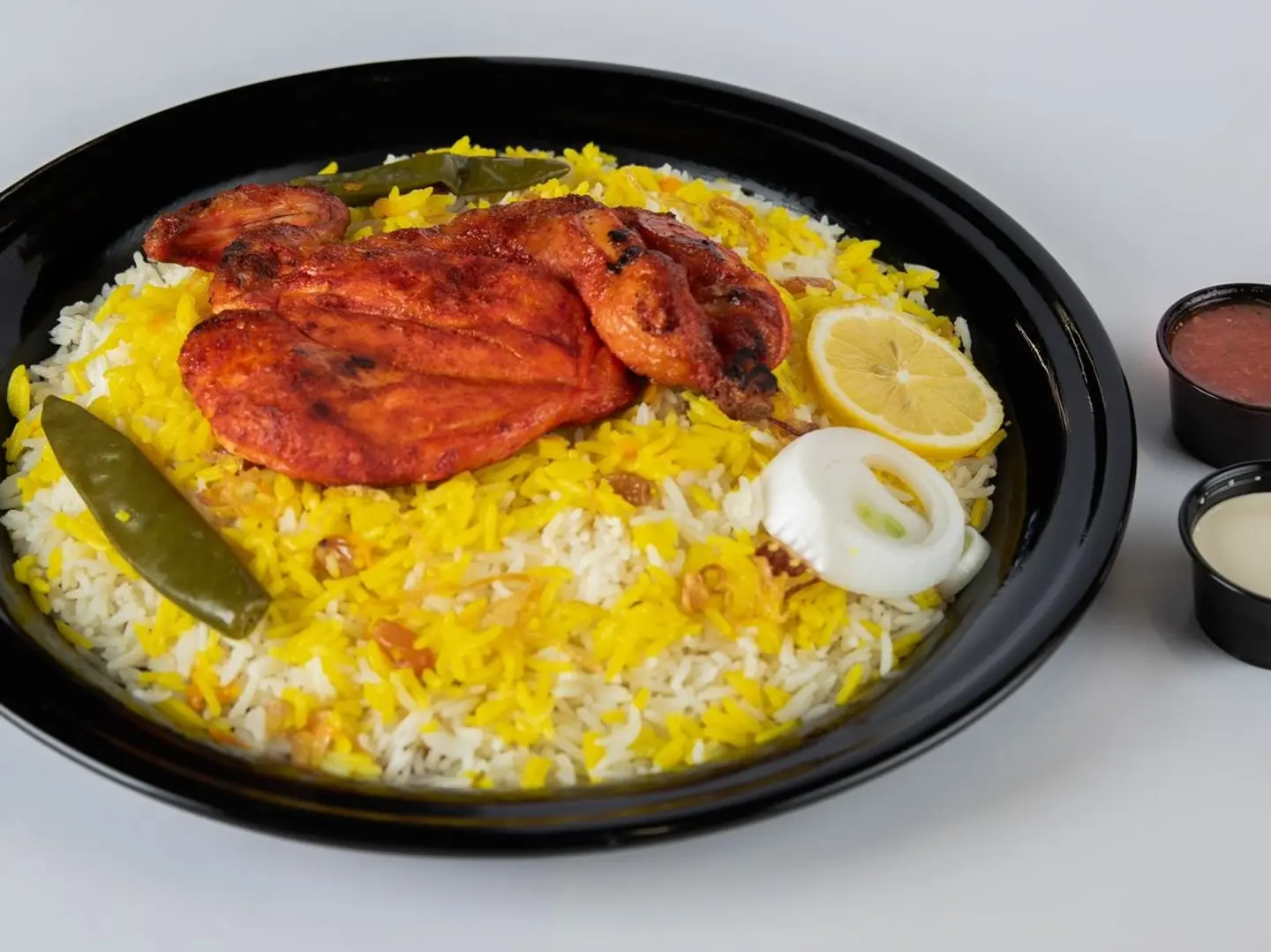 Whole Mathbi Chicken With Spicy Traditional Rice