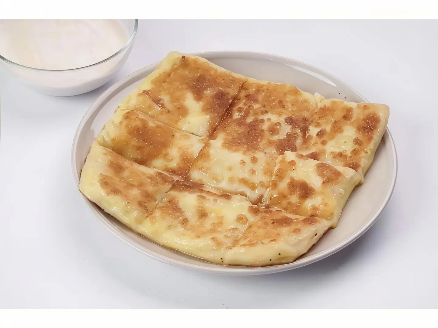 Mutabbak With Cream And Honey